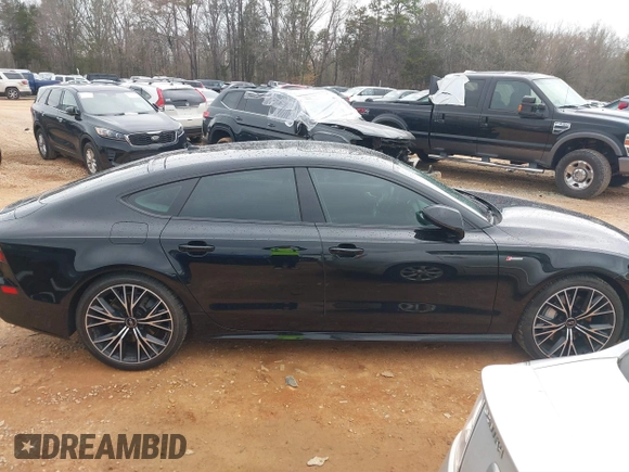 2016 Audi A7 Prestige z VIN WAU2GAFC5GN008438, wystawiony jako IAAI lot #41754579 z przebiegiem 122 794 mil mil oraz . Historia ofert i sprzedaży dostępna na DreamBid. Obrazek 12.