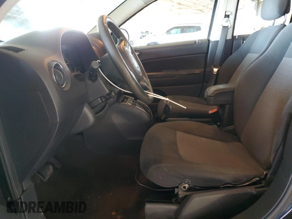 2014 Jeep Compass Sport with VIN 1C4NJCBA8ED881847, listed as a Copart auction lot 55325825 with 231,847 mi miles and Clean Title. Bid and sale history available at carsss.com. Image 7.