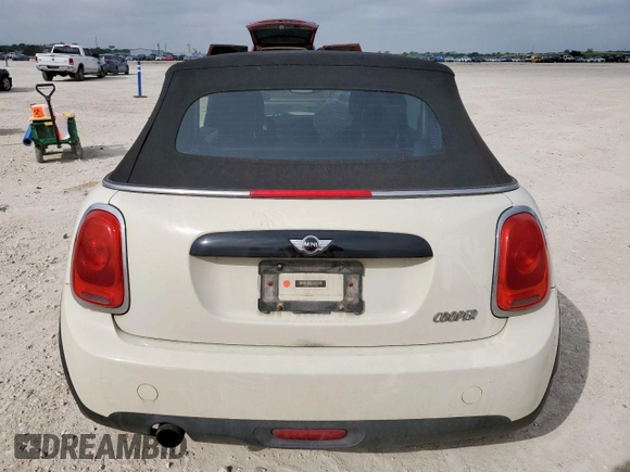 2017 MINI Convertible Cooper z VIN WMWWG5C32H3C20341, wystawiony jako Copart lot #57039685 z przebiegiem 100 575 mil mil oraz Szkoda całkowita • Salvage title. Historia ofert i sprzedaży dostępna na DreamBid. Obrazek 6.