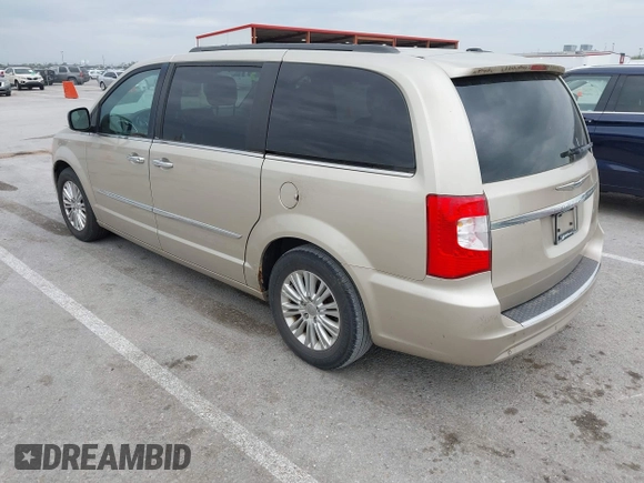 2012 Chrysler Town & Country Touring-L with VIN 2C4RC1CG3CR368471, listed as a IAAI auction lot 42045154 with 212,696 mi miles. Bid and sale history available at carsss.com. Image 3.