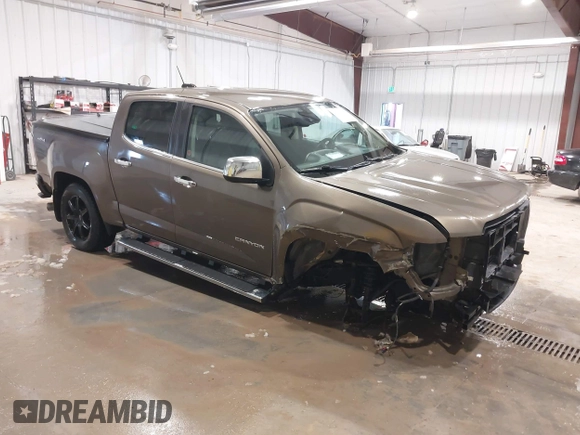 2016 GMC Canyon 4WD SLT z VIN 1GTP6DE13G1229783, wystawiony jako IAAI lot #41583360 z przebiegiem 80 149 mil mil oraz . Historia ofert i sprzedaży dostępna na DreamBid. Obrazek 1.