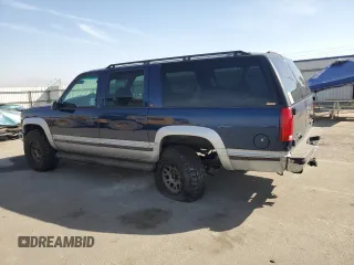1997 GMC Suburban z VIN 1GKFK16R6VJ758513, wystawiony jako Copart lot #75034574 z przebiegiem 181 873 mil mil oraz Szkody całkowita. Historia ofert i sprzedaży dostępna na DreamBid. Obrazek 2.