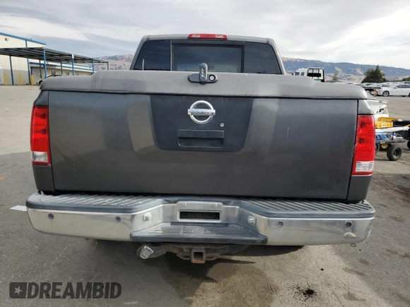 2005 Nissan Titan SE with VIN 1N6AA07B65N566082, listed as a Copart auction lot 80879174 with 215,297 mi miles and Clean Title. Bid and sale history available at carsss.com. Image 6.