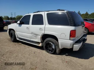2003 GMC Yukon Denali z VIN 1GKEK63U53J210632, wystawiony jako Copart lot #56098925 z przebiegiem 258 313 mil mil oraz Szkoda całkowita • Salvage title. Historia ofert i sprzedaży dostępna na DreamBid. Obrazek 2.