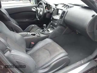 2010 Nissan 370Z Touring with VIN JN1AZ4FH3AM301311, listed as a IAAI auction lot 41976379 with 51,347 mi miles. Bid and sale history available at carsss.com. Image 5.