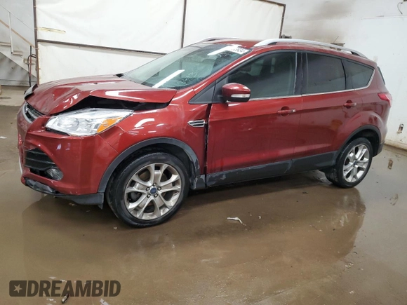 2016 Ford Escape Titanium with VIN 1FMCU9J95GUC57205, listed as a Copart auction lot 71033934 with 90,477 mi miles and Salvage Title. Bid and sale history available at DreamBid. Image 1.