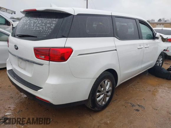 2020 Kia Sedona L with VIN KNDMA5C17L6595852, listed as a IAAI auction lot 41566584 with 102,712 mi miles. Bid and sale history available at carsss.com. Image 4.