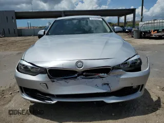 2013 BMW 3 Series 328i with VIN WBA3C1G52DNR49440, listed as a Copart auction lot 61546685 with 118,308 mi miles and Salvage title. Bid and sale history available at DreamBid. Image 5.