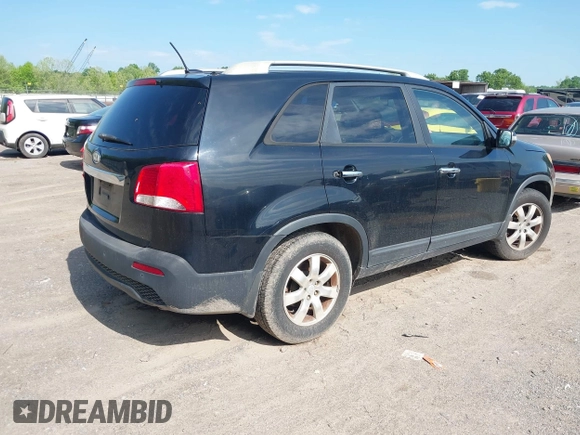 2012 Kia Sorento LX with VIN 5XYKT4A63CG189123, listed as a IAAI auction lot 42137121 with 329,389 mi miles. Bid and sale history available at carsss.com. Image 4.
