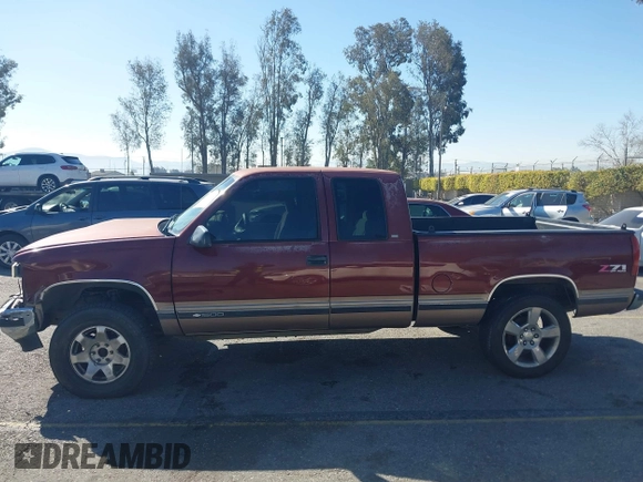 1997 Chevrolet Silverado 1500 with VIN 1GCEK19R4VE261195, listed as a IAAI auction lot 41637380 with 221,662 mi miles and . Bid and sale history available at DreamBid. Image 14.