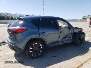 2016 Mazda CX-5 Grand Touring with VIN JM3KE2DY9G0724096, listed as a Copart auction lot 52249675 with 47,860 mi miles and Salvage Title. Bid and sale history available at carsss.com. Image 3.