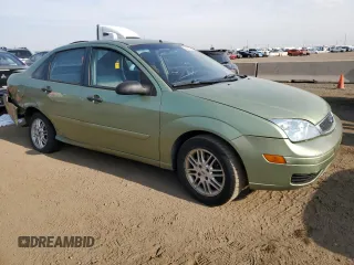 2007 Ford Focus S with VIN 1FAFP34N57W138756, listed as a Copart auction lot 54402375 with 260,127 mi miles and Salvage title. Bid and sale history available at DreamBid. Image 4.
