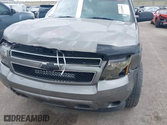 2007 Chevrolet Tahoe LS with VIN 1GNFC13C57R279441, listed as a IAAI auction lot 42428981 with 229,827 mi miles and . Bid and sale history available at DreamBid. Image 6.