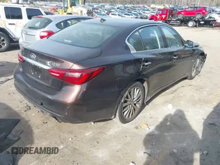 2019 Infiniti Q50 3.0t LUXE with VIN JN1EV7AP9KM512446, listed as a IAAI auction lot 41311730 with 105,000 mi miles. Bid and sale history available at carsss.com. Image 4.