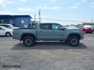 2023 Toyota Tacoma 4WD SR with VIN 3TYCZ5AN7PT145185, listed as a IAAI auction lot 41658297 with 23,647 mi miles. Bid and sale history available at carsss.com. Image 13.