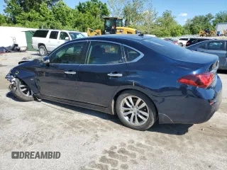 2015 Infiniti Q70 with VIN JN1BY1AR5FM561805, listed as a Copart auction lot 57892685 with 208,526 mi miles and Salvage title. Bid and sale history available at DreamBid. Image 2.