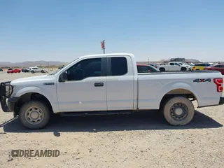 2018 Ford F-150 XL with VIN 1FTFX1E58JKD86995, listed as a IAAI auction lot 42256816 with 146,888 mi miles and . Bid and sale history available at DreamBid. Image 14.