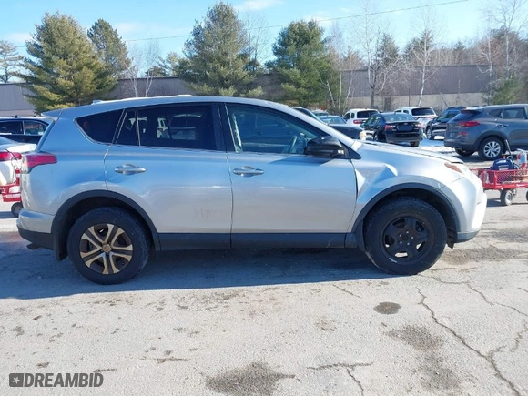 2018 Toyota RAV4 LE with VIN 2T3BFREV7JW728587, listed as a IAAI auction lot 41312419 with 103,134 mi miles. Bid and sale history available at carsss.com. Image 13.