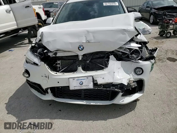 2016 BMW X1 xDrive28i z VIN WBXHT3C38GP888096, wystawiony jako Copart lot #52752255 z przebiegiem 115 084 mil mil oraz Szkoda całkowita • Salvage title. Historia ofert i sprzedaży dostępna na DreamBid. Obrazek 11.