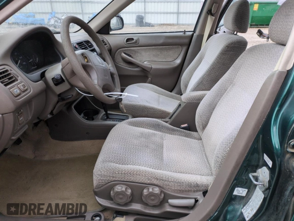 2000 Honda Civic LX with VIN 2HGEJ6676YH512977, listed as a Copart auction lot 50985455 with 242,759 mi miles and Salvage Title. Bid and sale history available at DreamBid. Image 7.