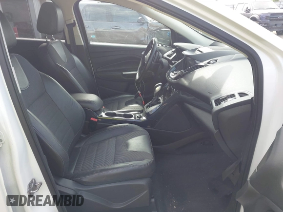 2013 Ford Escape Titanium with VIN 1FMCU9J96DUC60268, listed as a IAAI auction lot 42095407 with 105,307 mi miles and . Bid and sale history available at DreamBid. Image 5.