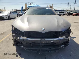 2024 BMW 8 Series 840i with VIN WBAGV2C08RCP97713, listed as a Copart auction lot 57355405 with 14,802 mi miles and Salvage title. Bid and sale history available at DreamBid. Image 5.