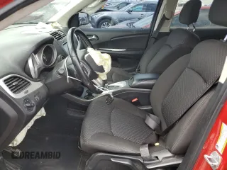 2019 Dodge Journey SE with VIN 3C4PDCBB1KT872339, listed as a Copart auction lot 61421265 with 77,157 mi miles and Salvage title. Bid and sale history available at DreamBid. Image 7.