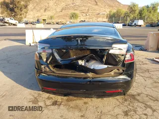 2022 Tesla Model S with VIN 5YJSA1E50NF462647, listed as a IAAI auction lot 41354668 with Not Provided miles and . Bid and sale history available at DreamBid. Image 15.