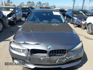 2015 BMW 3 Series 328i with VIN WBA3C1C51FK123852, listed as a IAAI auction lot 41857179 with 90,308 mi miles and . Bid and sale history available at carsss.com. Image 12.