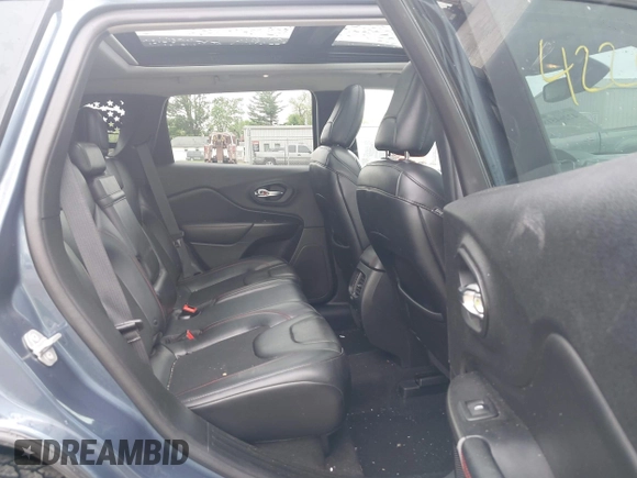 2019 Jeep Cherokee Trailhawk z VIN 1C4PJMBX1KD364100, wystawiony jako IAAI lot #42264518 z przebiegiem 117 020 mil mil oraz . Historia ofert i sprzedaży dostępna na DreamBid. Obrazek 8.