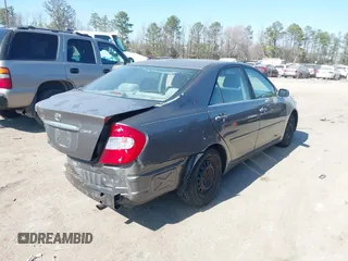 2003 Toyota Camry LE with VIN 4T1BE32K63U659008, listed as a IAAI auction lot 41790929 with 206,878 mi miles and . Bid and sale history available at DreamBid. Image 4.