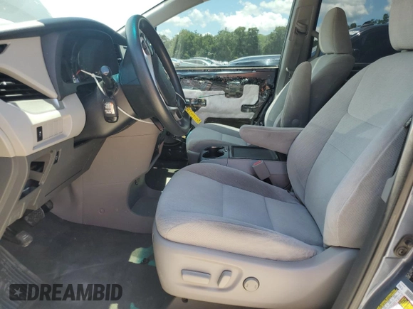 2015 Toyota Sienna LE AAS with VIN 5TDKK3DC2FS651385, listed as a Copart auction lot 62451275 with 166,610 mi miles and Salvage title. Bid and sale history available at DreamBid. Image 7.