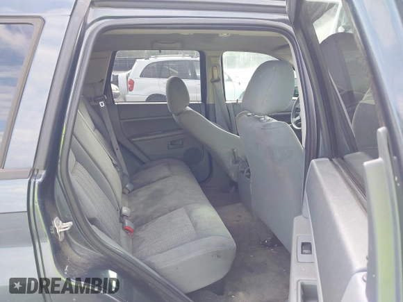 2007 Jeep Grand Cherokee Laredo with VIN 1J8GS48K17C684497, listed as a IAAI auction lot 42136314 with 155,024 mi miles. Bid and sale history available at carsss.com. Image 8.