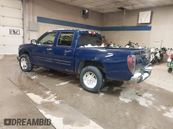 2011 GMC Canyon SLE1 with VIN 1GTH6MFE3B8123808, listed as a IAAI auction lot 41611231 with 142,877 mi miles. Bid and sale history available at carsss.com. Image 3.