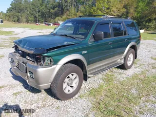 2000 Mitsubishi Montero Sport LS with VIN JA4LS31H0YP055199, listed as a IAAI auction lot 41990427 with 162,687 mi miles. Bid and sale history available at carsss.com. Image 18.