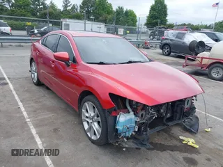 2015 Mazda 6 i Touring with VIN JM1GJ1T58F1182171, listed as a IAAI auction lot 42341575 with 143,150 mi miles and . Bid and sale history available at DreamBid. Image 1.