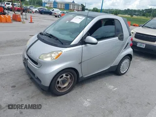 2009 Smart fortwo Pure with VIN WMEEJ31X69K317204, listed as a IAAI auction lot 42779603 with 159,179 mi miles and . Bid and sale history available at DreamBid. Image 2.