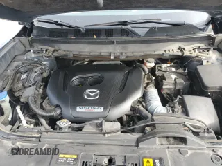 2021 Mazda CX-9 Grand Touring z VIN JM3TCADYXM0519757, wystawiony jako Copart lot #86665134 z przebiegiem 51 217 mil mil oraz Szkoda całkowita • Salvage title. Historia ofert i sprzedaży dostępna na DreamBid. Obrazek 13.
