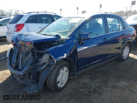 2009 Nissan Versa 1.8 S with VIN 3N1BC11E29L360857, listed as a IAAI auction lot 40629379 with 114,499 mi miles. Bid and sale history available at carsss.com. Image 2.