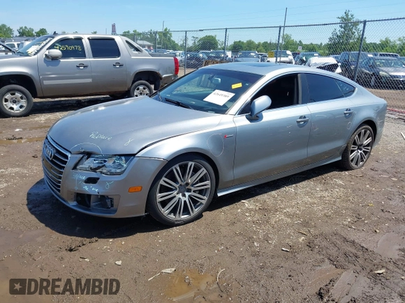 2012 Audi A7 Prestige with VIN WAU2GAFC3CN134940, listed as a IAAI auction lot 42649389 with 163,450 mi miles and . Bid and sale history available at DreamBid. Image 2.