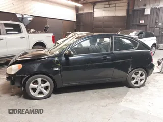 2007 Hyundai Accent SE with VIN KMHCN36C67U026540, listed as a IAAI auction lot 41062633 with 70,143 mi miles. Bid and sale history available at carsss.com. Image 15.