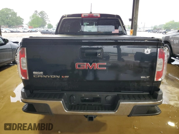 2018 GMC Canyon 4WD SLT z VIN 1GTG6DEN0J1176969, wystawiony jako Copart lot #53316515 z przebiegiem 109 026 mil mil oraz Szkoda całkowita • Salvage title. Historia ofert i sprzedaży dostępna na DreamBid. Obrazek 6.