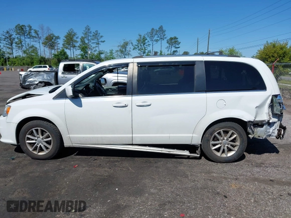 2018 Dodge Grand Caravan SXT with VIN 2C4RDGCG1JR326457, listed as a IAAI auction lot 42047301 with 84,518 mi miles and . Bid and sale history available at DreamBid. Image 14.
