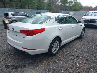 2012 Kia Optima LX with VIN KNAGM4A78C5289431, listed as a IAAI auction lot 42026917 with 148,867 mi miles and . Bid and sale history available at carsss.com. Image 4.