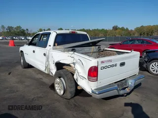 2001 Dodge Dakota Sport with VIN 1B7GL2AN81S127838, listed as a IAAI auction lot 40687174 with 235,301 mi miles. Bid and sale history available at carsss.com. Image 3.