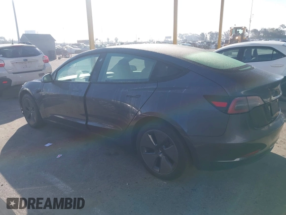 2023 Tesla Model 3 with VIN 5YJ3E1EA5PF697201, listed as a IAAI auction lot 41589422 with 16,862 mi miles and . Bid and sale history available at carsss.com. Image 14.