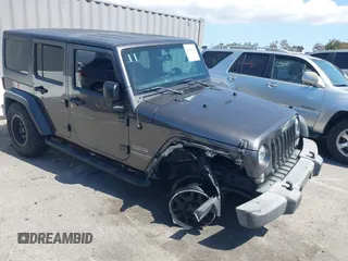 2016 Jeep Wrangler Unlimited Sport z VIN 1C4BJWDG7GL229364, wystawiony jako IAAI lot #42239069 z przebiegiem 87 001 mil mil oraz . Historia ofert i sprzedaży dostępna na DreamBid. Obrazek 1.