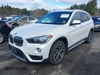 2019 BMW X1 xDrive28i with VIN WBXHT3C56K5L35842, listed as a IAAI auction lot 41981409 with 54,325 mi miles. Bid and sale history available at carsss.com. Image 17.