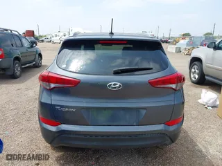 2017 Hyundai Tucson SE Plus with VIN KM8J33A42HU375273, listed as a IAAI auction lot 41900474 with 124,658 mi miles. Bid and sale history available at carsss.com. Image 16.