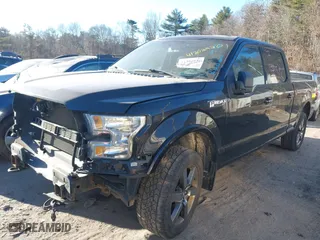 2015 Ford F-150 XLT w/HD Payload Pkg with VIN 1FTFW1EF4FFB92914, listed as a IAAI auction lot 41202920 with 155,497 mi miles. Bid and sale history available at carsss.com. Image 18.